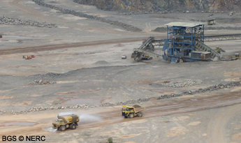 Dust suppression in operation, Torr Works Quarry, with the mobile crusher in the background.