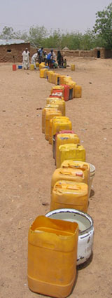 Long queues at a borehole which provides the only resilient supply in the area within a prolonged dry period