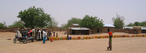 Long queues develop within the dry season at a resilient water supply