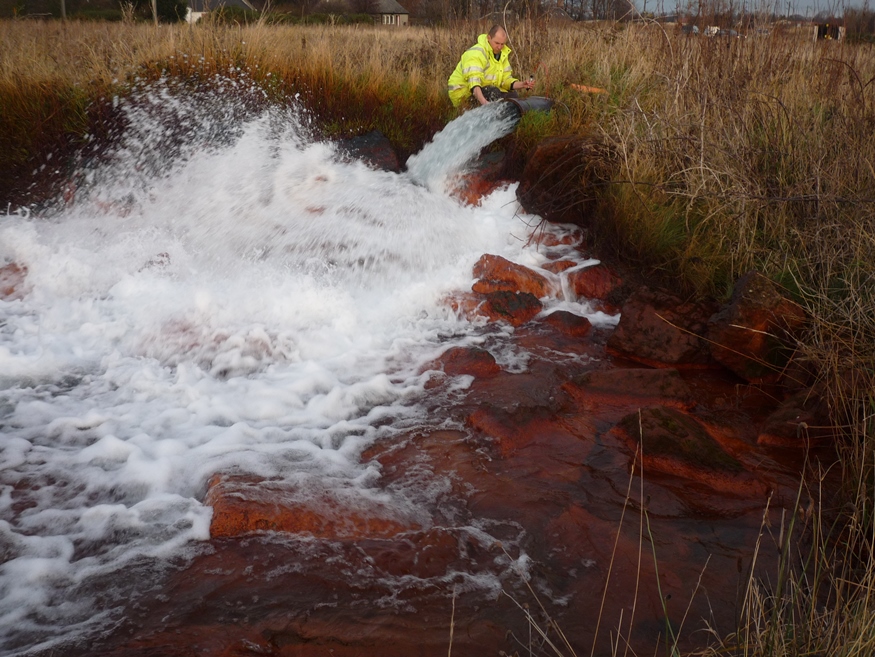Sampling a pumped outflow from an abandoned coal mine in East Lothian