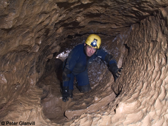 Phreatic tube developed along an inclined bedding plane, Swildon's Hole, Priddy.